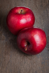 two ripe red apples close up