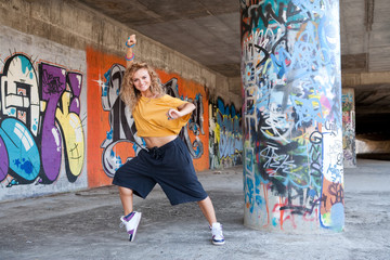 Beautiful young blond model. Graffiti