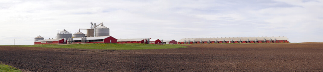 Big Red Farm with stormy sky