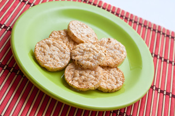 Plate with rice crackers.