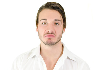 Fototapeta premium Disappointed or disgusted young man