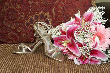 Beautiful bridal shoes and flower bouquet