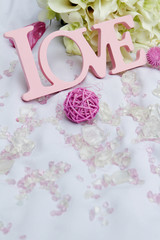 word love and decoration details over white, wedding decor
