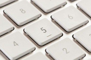 Number Keypad on a White and Grey Computer Keyboard