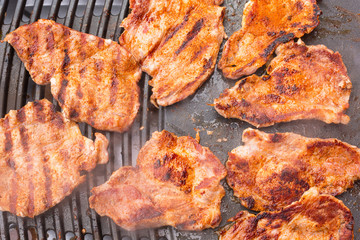 Pork meat grilled on barbecue