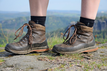 Naklejka premium Hiking woman in trekking boots