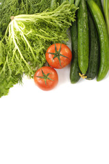 Healthy food. cucumbers and red tomato and green lettuce