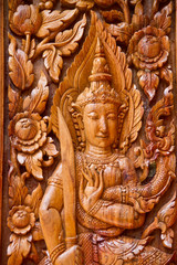 Fototapeta na wymiar Thai carving wood at window temple