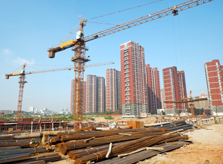Construction site with crane and building