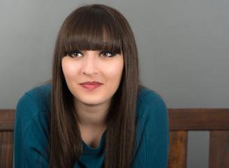Fototapeta premium studio portrait of attractive young woman with long hair