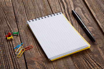 Notepad on a wooden table