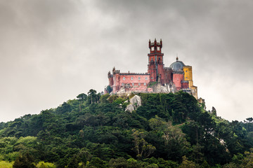 Fototapeta na wymiar Pena Palace in Sintra near Lisbon in Rainy Weather, Portugal
