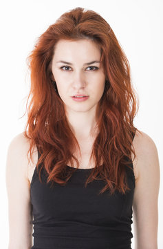 Angry young lady with red hair