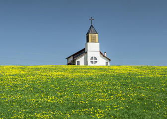 Rural church in a field