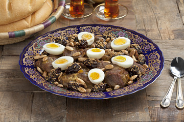 Moroccan meat, plums and eggs