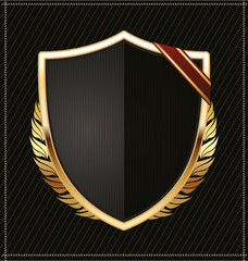 Obraz premium Black and gold shield