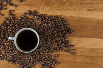 Coffee theme with wooden table and dark background