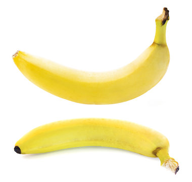 Set of two spotless yellow bananas over white