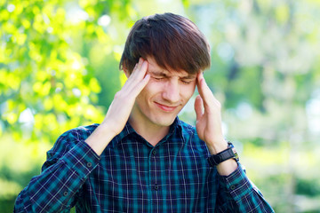 student with a headache