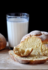 Bread rolls and glass of milk