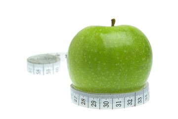 Dieting  concept - measurement and apple fruit