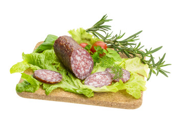 Salami with rosemary, salad and tomatoes
