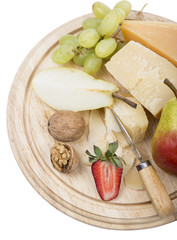 cheese and fruit on a white background
