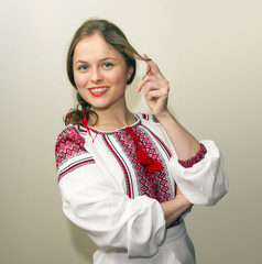 Portrait of beautiful young woman in the Ukrainian national clot