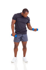 african american man exercising with dumbbells