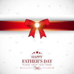 Happy Fathers Day greeting card with red ribbon.
