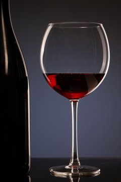 Elegant photo of a glass of red wine