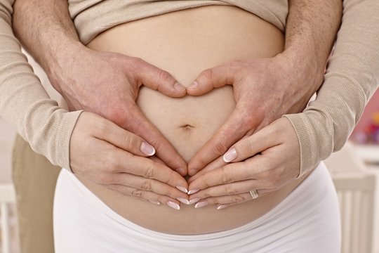 Closeup photo of pregnant tummy