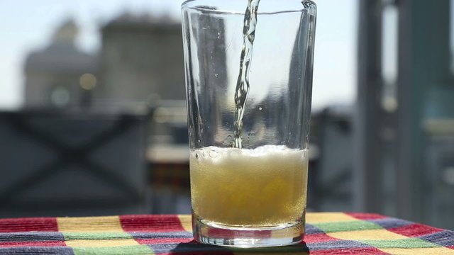 Beer being poured in the glass