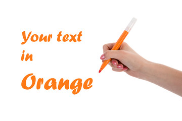 Hand writing with orange pencil isolated on white background