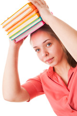 Teenager girl with books