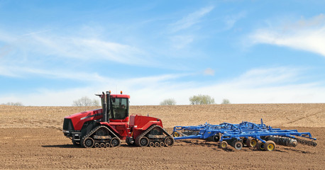 Red Tractor and Plow