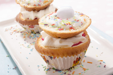 cupcake with cream and sprinkles