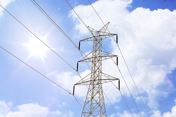 High voltage electirc post with blue sky.
