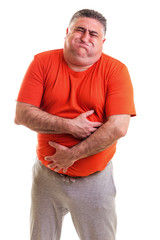 Overweight man with strong stomach pain