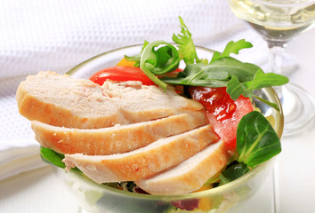 Chicken breast with salad greens