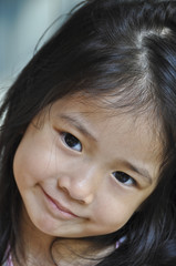 Obraz premium Little Asian girl smile.