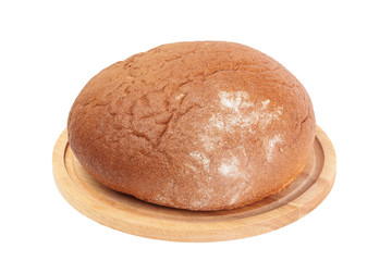 loaf of rye bread  on wooden board isolated on white