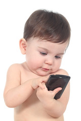 Beautiful baby playing and touching a mobile phone