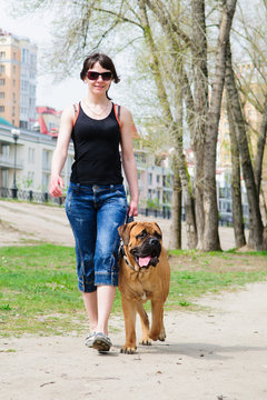 woman and dog bullmastiff
