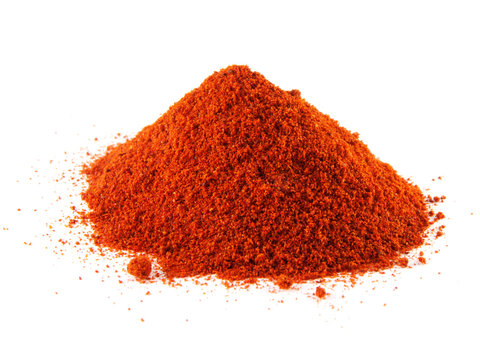 Ground red chili hot pepper. Hill of sweet paprika