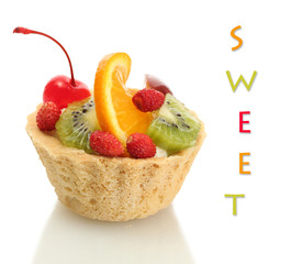 Sweet cake with fruits isolated on white