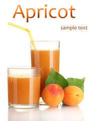 Two glasses of apricot juice and apricots with leaf isolated
