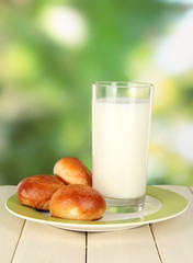 Bread rolls and glass of milk
