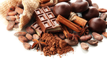 Composition of chocolate sweets, cocoa and spices, isolated