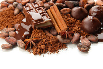 Composition of chocolate sweets, cocoa and spices, isolated